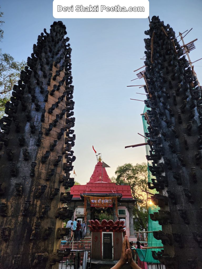 Maa Harsiddhi Temple with the famous Lamp Posts adorned with hundreds of giant diyas. Pic taken by DeviShaktiPeetha.com